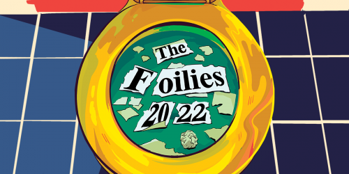 Image of a gold toilet with scraps of paper spelling out "The Foilies" floating in the water